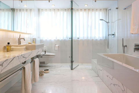marble bathroom with bathtub