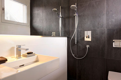 bathroom, modern white washbasin, granite shower area