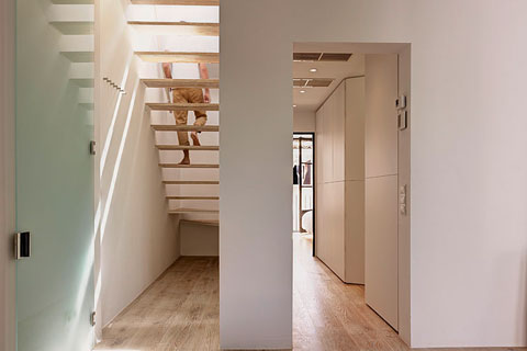 bright hallway and open staircase