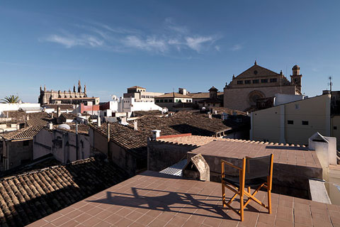rooftop with chair overlooking the old part of Palma de Mallorca