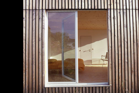 wooden facade with open window