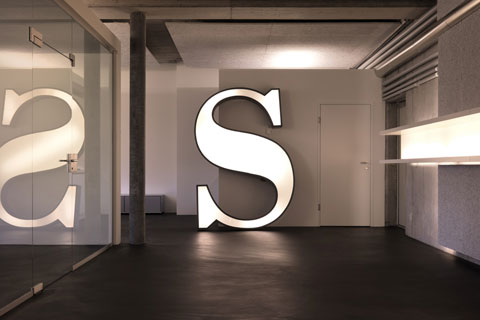 close-up of the logo, the capital S stands for Sensational AG