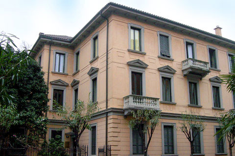 Neoclassical facade of the three-storey house in Lugano